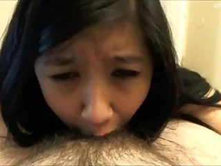 Cute asian girlfriend giving spectacular blowjob
